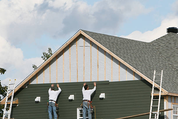 Professional Siding Installation technician working in Charles City, VA